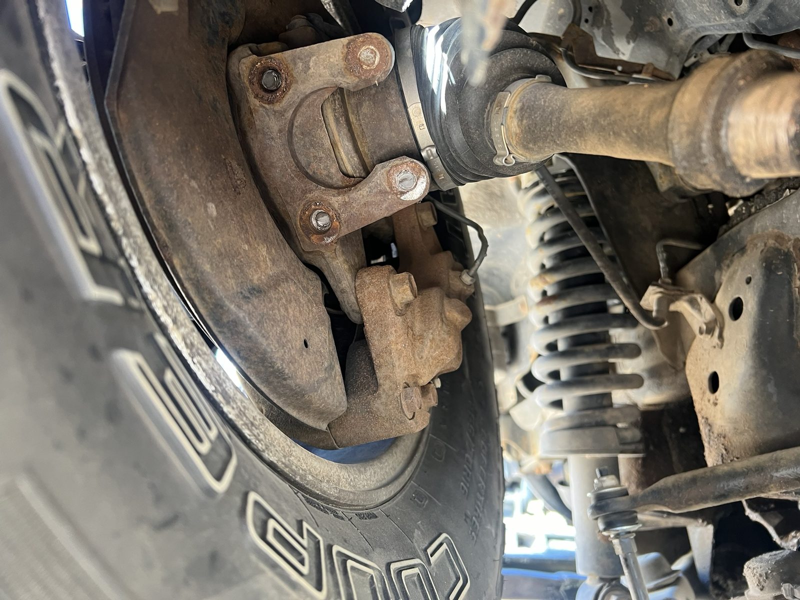 Sheared lower ball-joint bolts on a customer’s vehicle