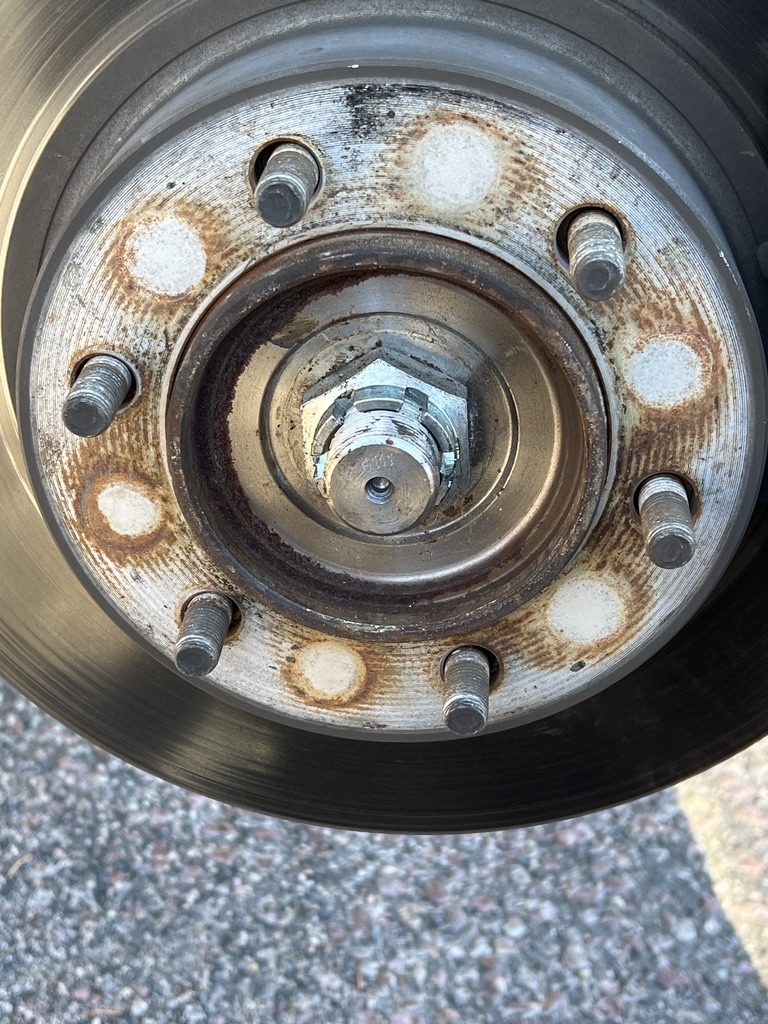 Rusted wheel hub and brake rotor on a customer vehicle